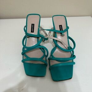 Women’s size 12M Nine West Teal Strapy Heels